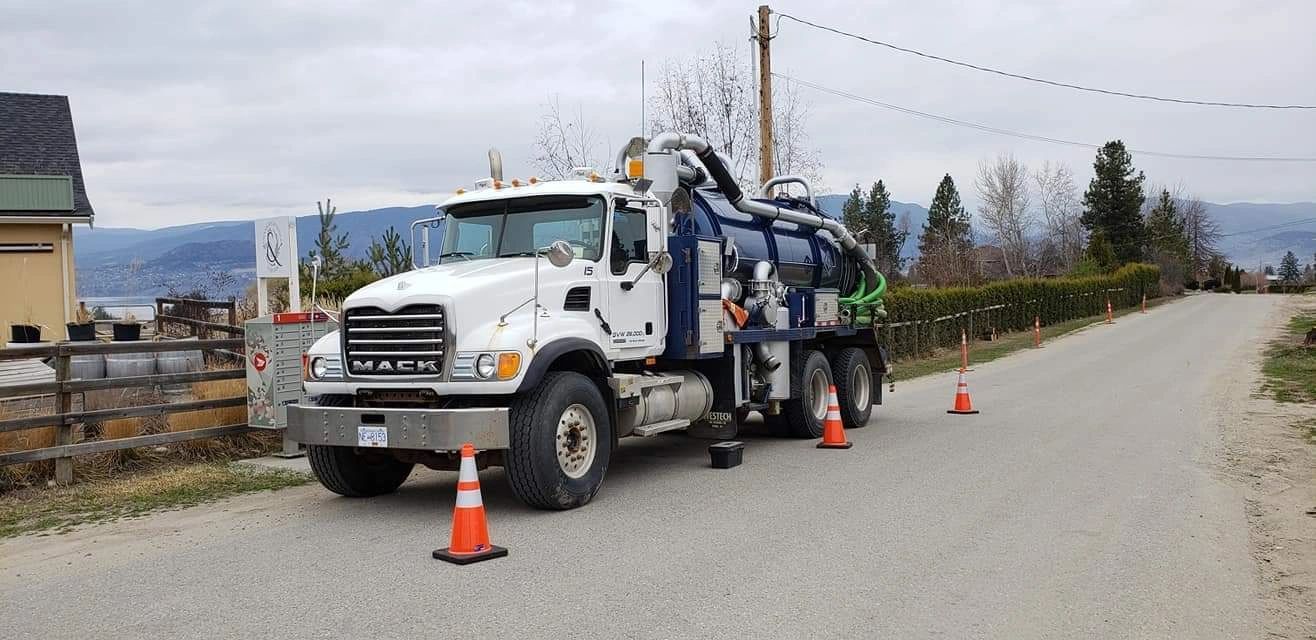 Graf-Vac vacuum truck on an Okanagan road